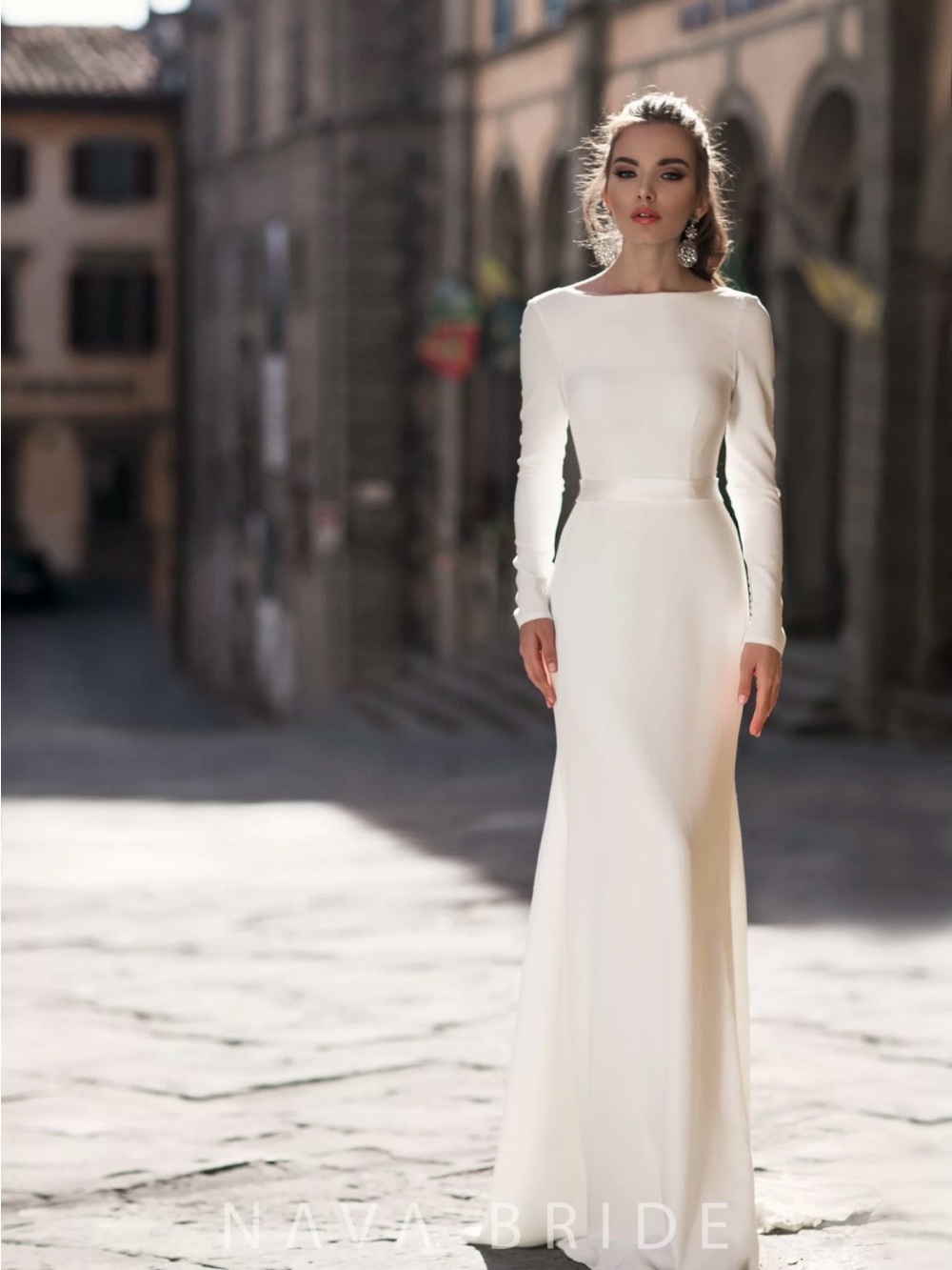 Long-Sleeve Ivory Bridal Gown with Low Scoop Back